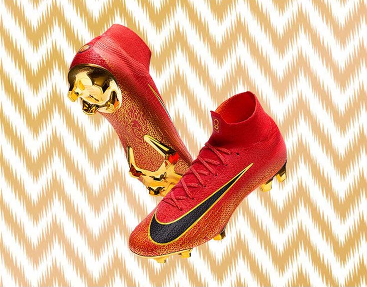 Red and gold cr7 football best sale boots